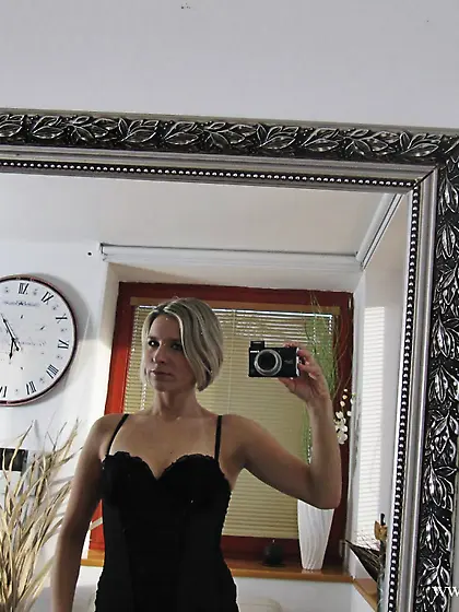 Bianca Ferrero with camera in hands strips naked in front of the