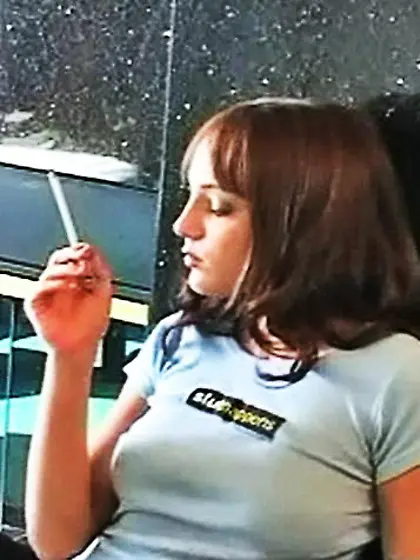 Cute babe sits floor