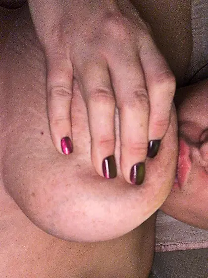 Dirty Whore Sucking her Titties