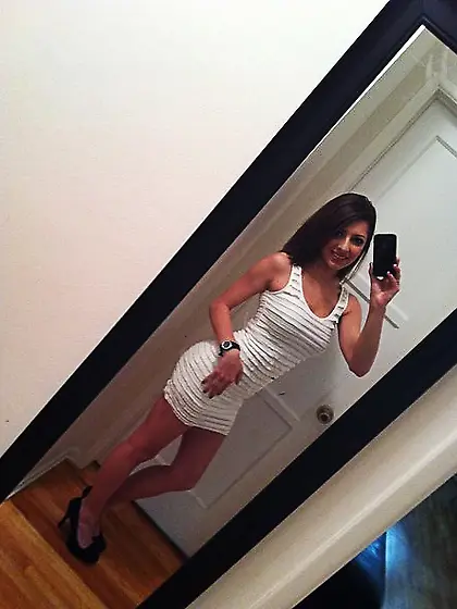 Luscious brunette chick is ready to pull clothes off to show tit