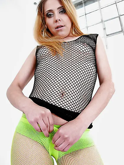 Russian woman takes her green stockings and panties off leaving