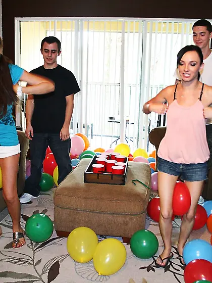 Drunk party girls getting banged side by side on a brown couch