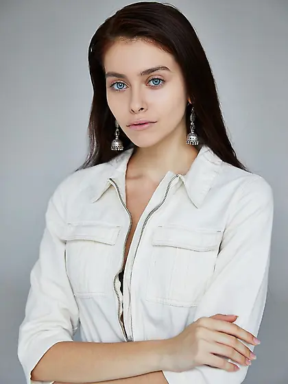 Pretty young brunette poses