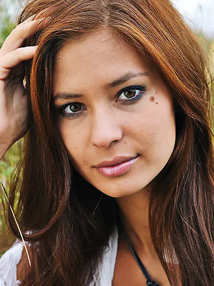 Beautiful young girl shows