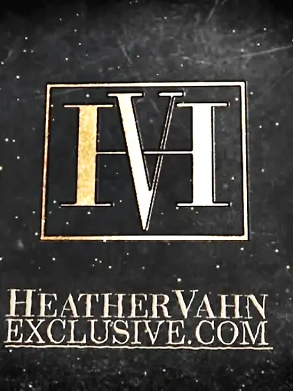 Black bra brunette uses a black dildo to...