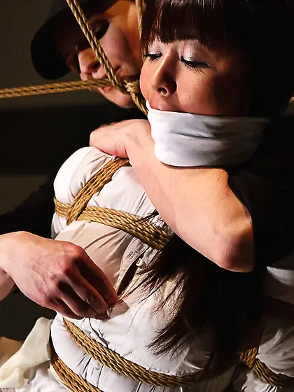 Sexy Asian submissive restrained and fisted...