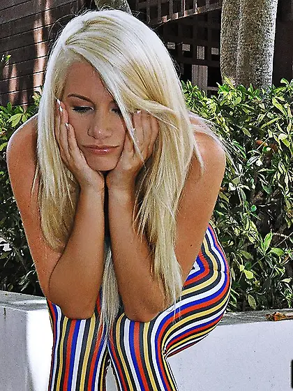 Gorgeous blonde angel Laela Pryce is gagging on a stiff white di