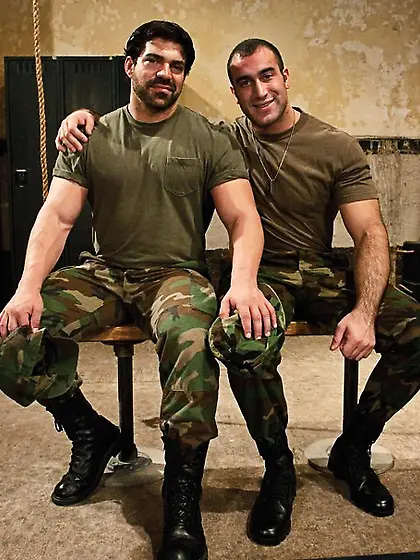 Muscular bearded military jeering