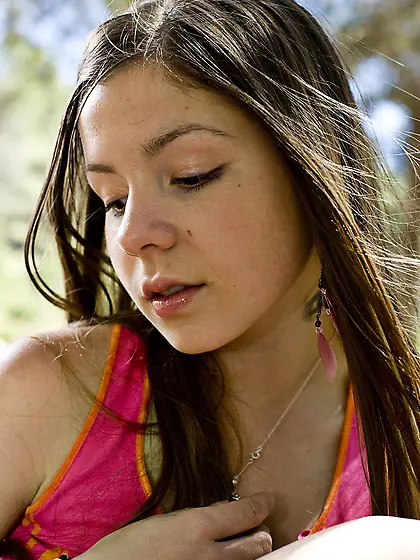 Lusty teen cuttie Emily 18 slowly strips in the woods and shows