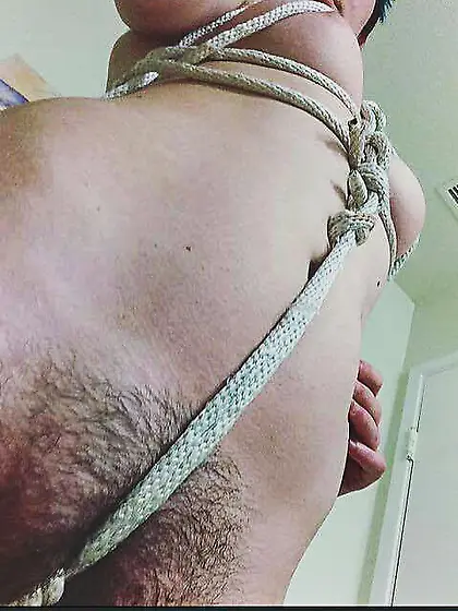 Sexy teen plays with bondage ropes