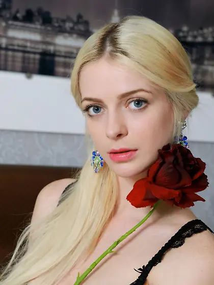 Black lingerie blonde shows her peachy pale pussy in a hot galle