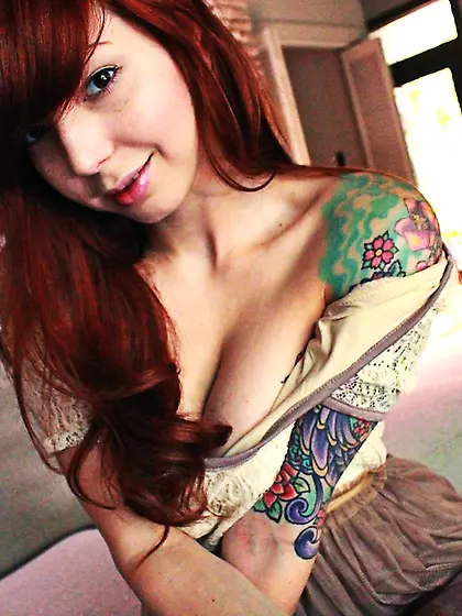 Naughty redhead doll Ivy Jean is wrapping the fat sex toy with h