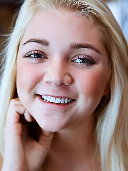 Pretty looking blonde Jessie Andrews is orally worshipping cock