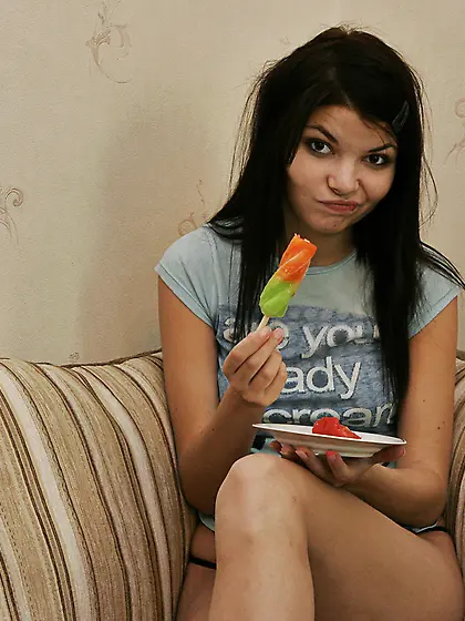 Cute emo teen Kaira 18 strips her panties on the sofa and finger