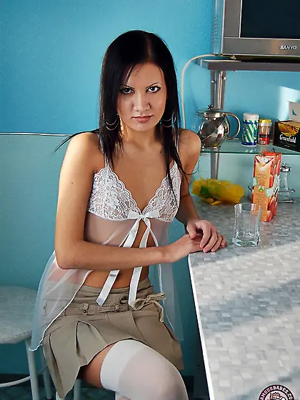 In the morning enticing brunette feels desire to pose naked in t