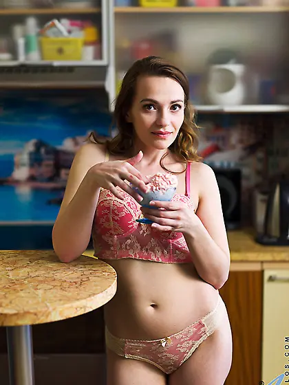 Cute blonde plays cream