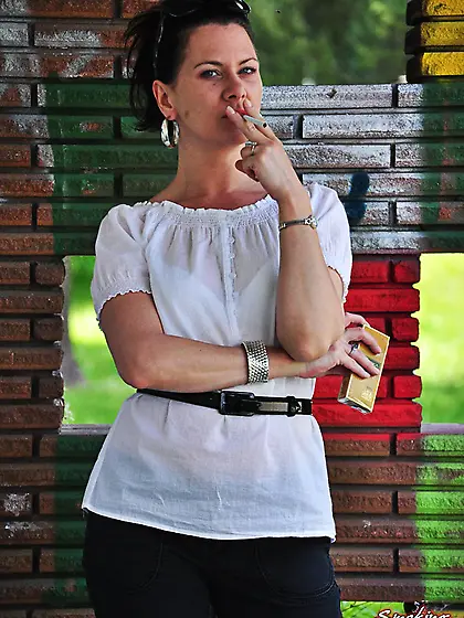 Black-haired babe white-dress takes