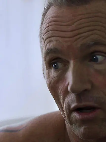 Wife watches husband and friend 