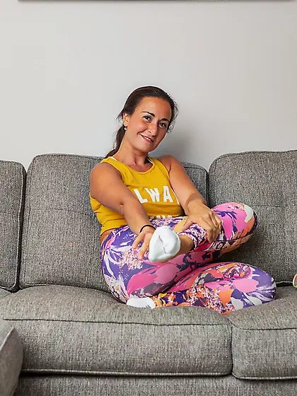 Charming babe in a colorful outfit is prepared to be kinky