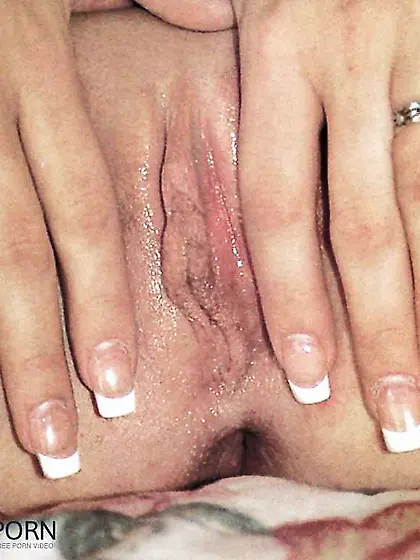 Laughing blond posing her nice assets