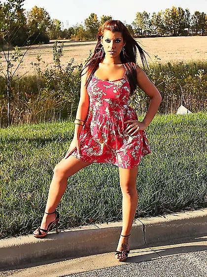 Foxy redhead babe Briana Lee Online strips her red dress and sho