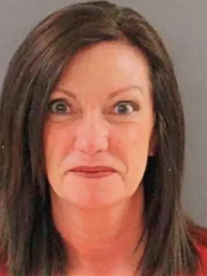 Rhonda roots for her team with her tits out