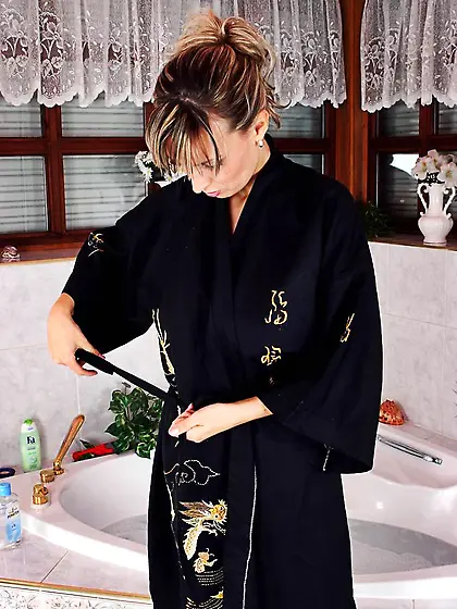 This is the softcore session in which Milly Morris is pouring oi