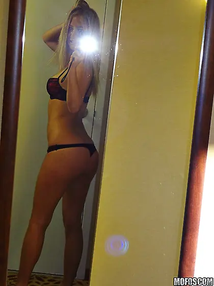 Casi James strips her sexy black and red lingerie off and jumps