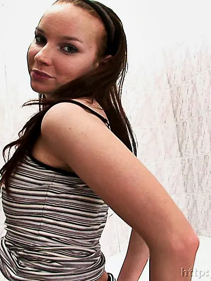 Russian teen brunette shaves her pussy and masturbates