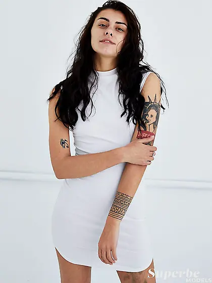 Hot tattooed brunette is proud of her fine...