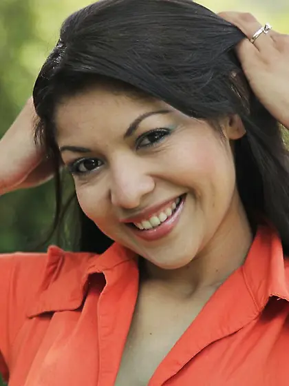 Busty tanned brunette Natalia Spice showing her sexy body wearin