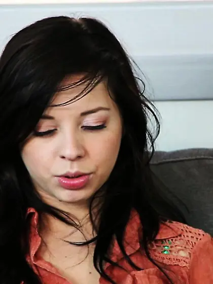 Pretty brunette smiles shyly