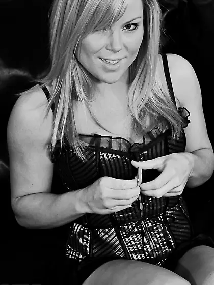 Gorgeous blonde Meet Madden poses in her black lace lingerie in