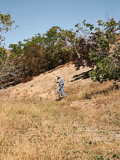 Emma Mae spreads her sexy long legs outdoors and gets her vagina