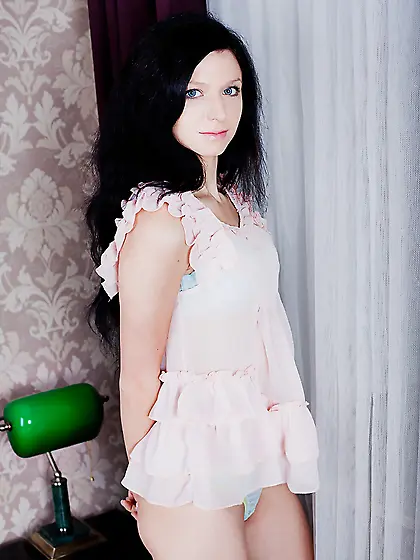 Brunette sweetie with blue eyes turns on and shoves fingers into