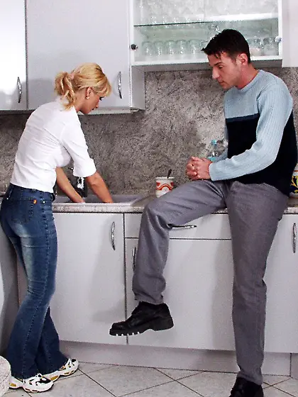 Foxy busty blonde Judy Twistys strips in the kitchen and gets he