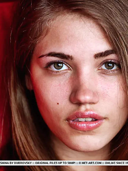 Cute teen brunette sits