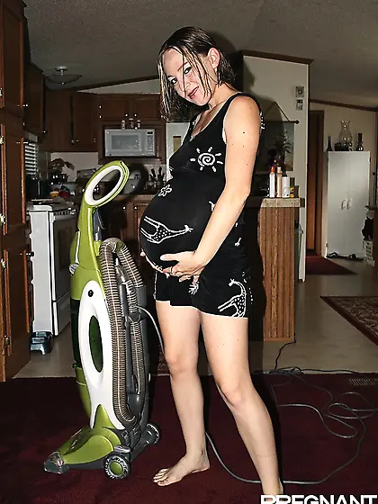 Cheeky pregnant girl slips-off