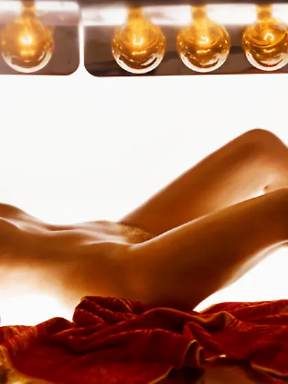 Tanned busty blonde model