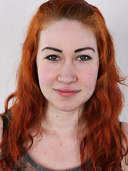 Excellent red-haired lady grey