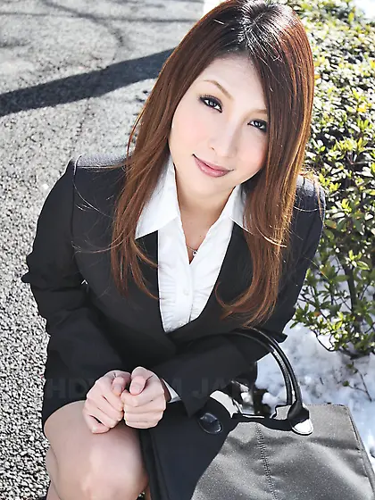 Beautiful Japanese secretary seductively poses while going at he