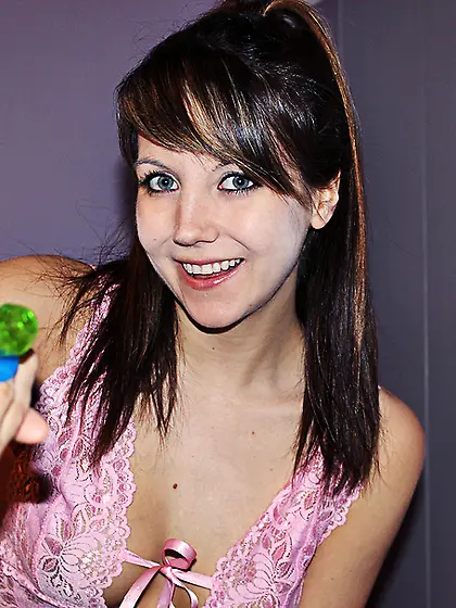 Brunette pink nightgown shows