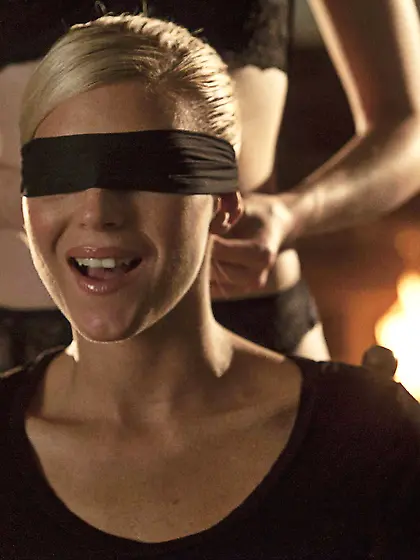 Blindfolded blonde enjoying BDSM lezdom torture,  courtesy of a r