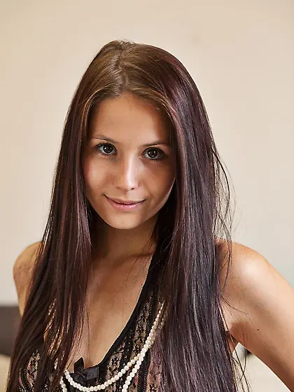 Petite teen Vanessa Angel lets her long brunette hair down and s