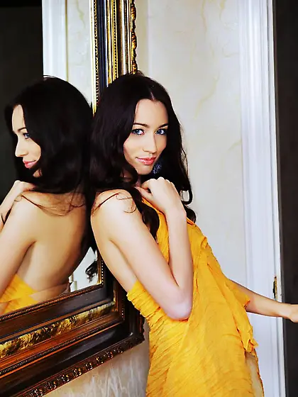 Hot brunette babe Zsanett Tormay wraps her sexy nude body in yel