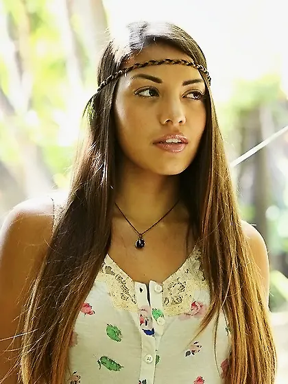 Exotic locales with verdant tropical landscapes perfect for her