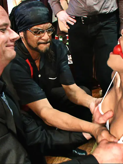 Blonde guy fingers ropes