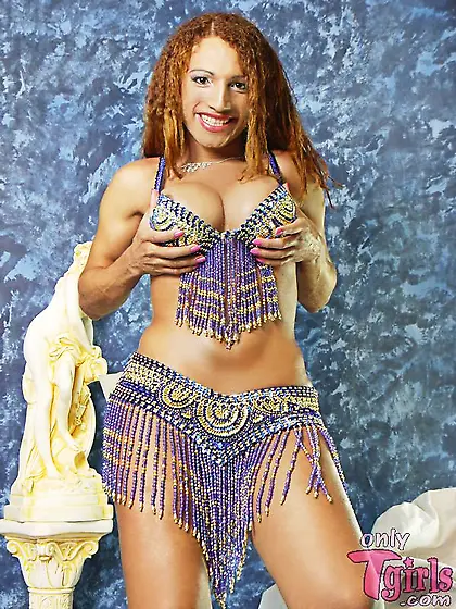 Redhead Emanuelle is a sexy dancer