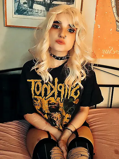 Metalhead showing off her goods