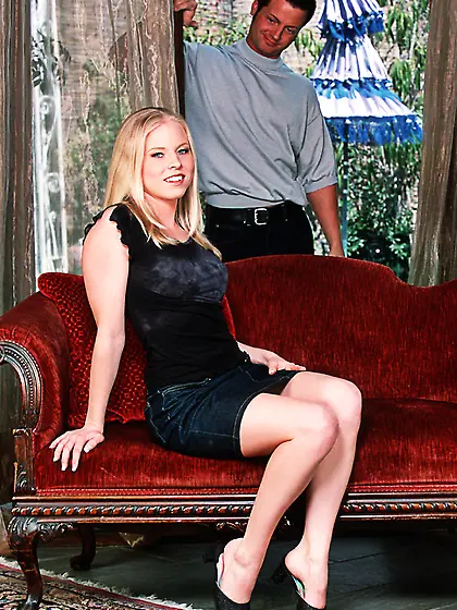 Foxy blonde gal Amber Rain strips her black dress and jumps on b